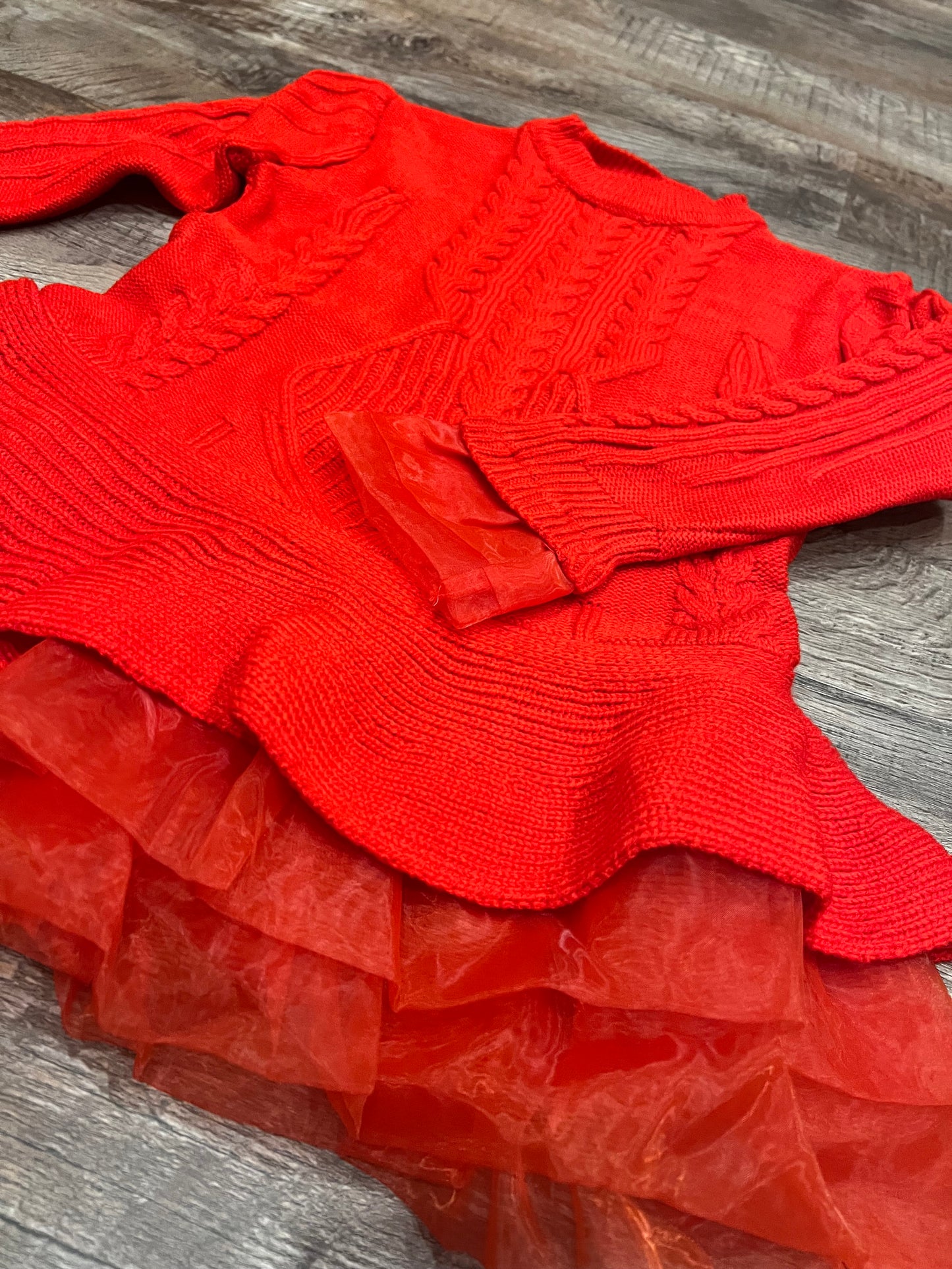 Absolutely adorable red cable knit and sheer skirted tunic sweater dress.